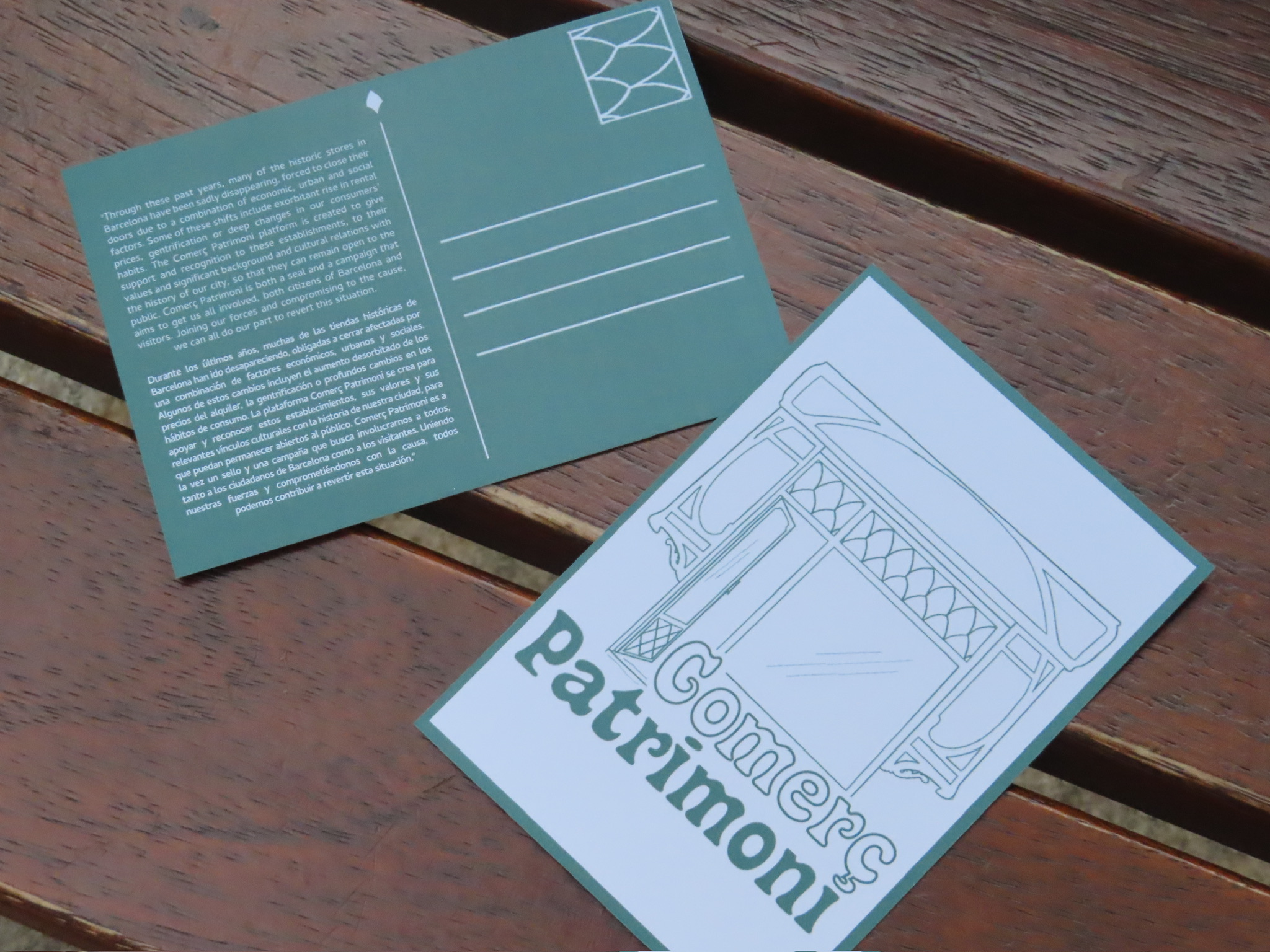 two postcards lying on the ground